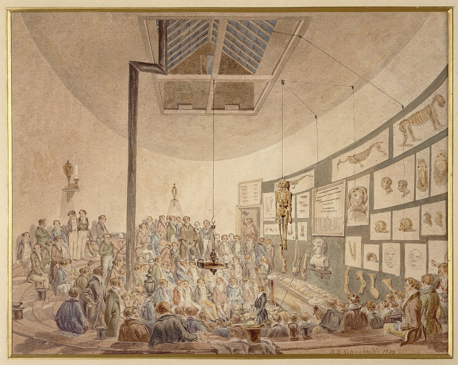 Aquarell von 1839 einer Anatomiestunde in London: Studierende auf einer kreisförmigen Tribüne umringen den Lehrer unter einem Oberlicht, mit einem hängenden Skelett und anatomischen Zeichnungen an den Wänden.
